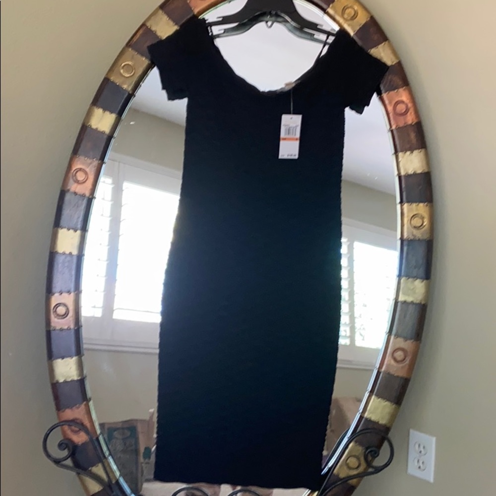Fitted Michael Kors black cocktail dress.